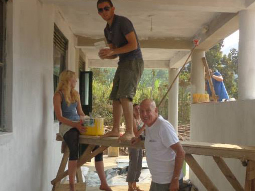 Volunteers building new medical centre in Uganda.