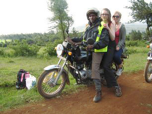 volunteers-using-the-moto-taxi-motorbike-kenya-masai