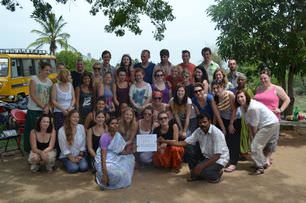 volunteers-pose-for-photo-at-school-with-school-director-and-his-wife-india